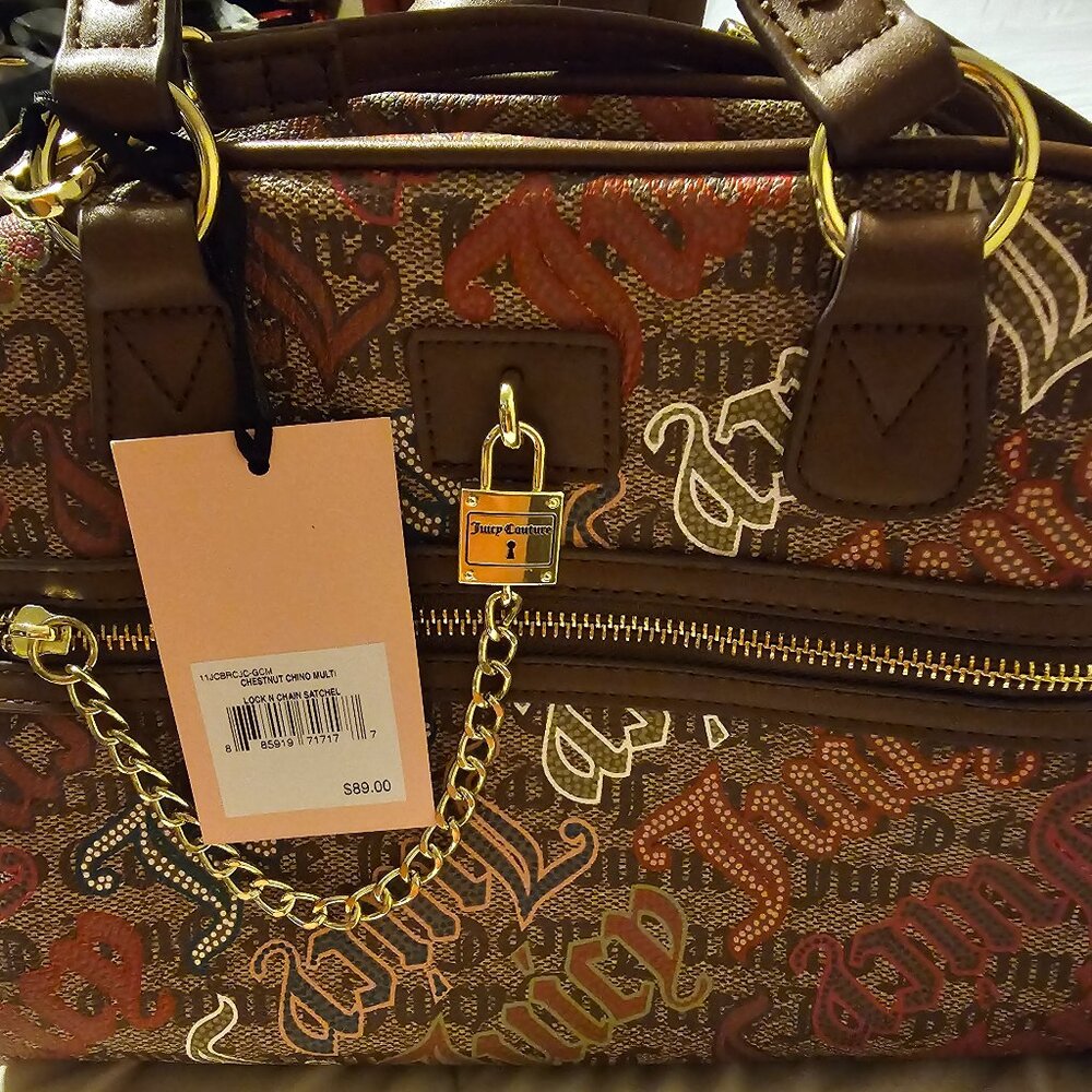Juicy Couture satchel with detachable strap and gold tone hardware.